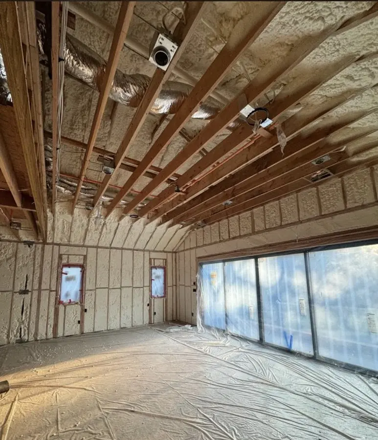 Interior walls and ceiling insulated with spray foam during new construction in Shively